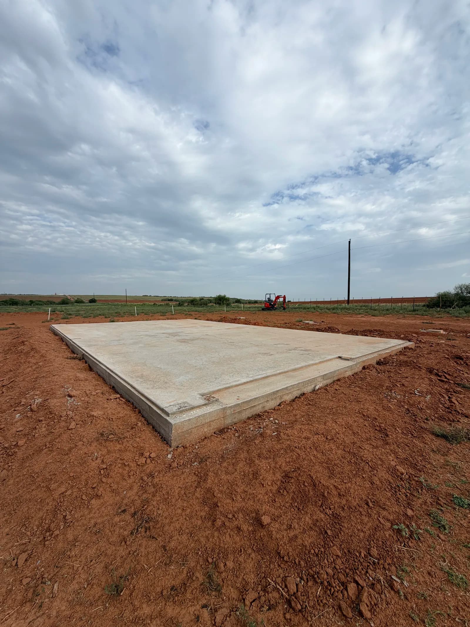 Paducah 24' x 40' Metal Building Foundation — finished slab and pier footings in Paducah, TX