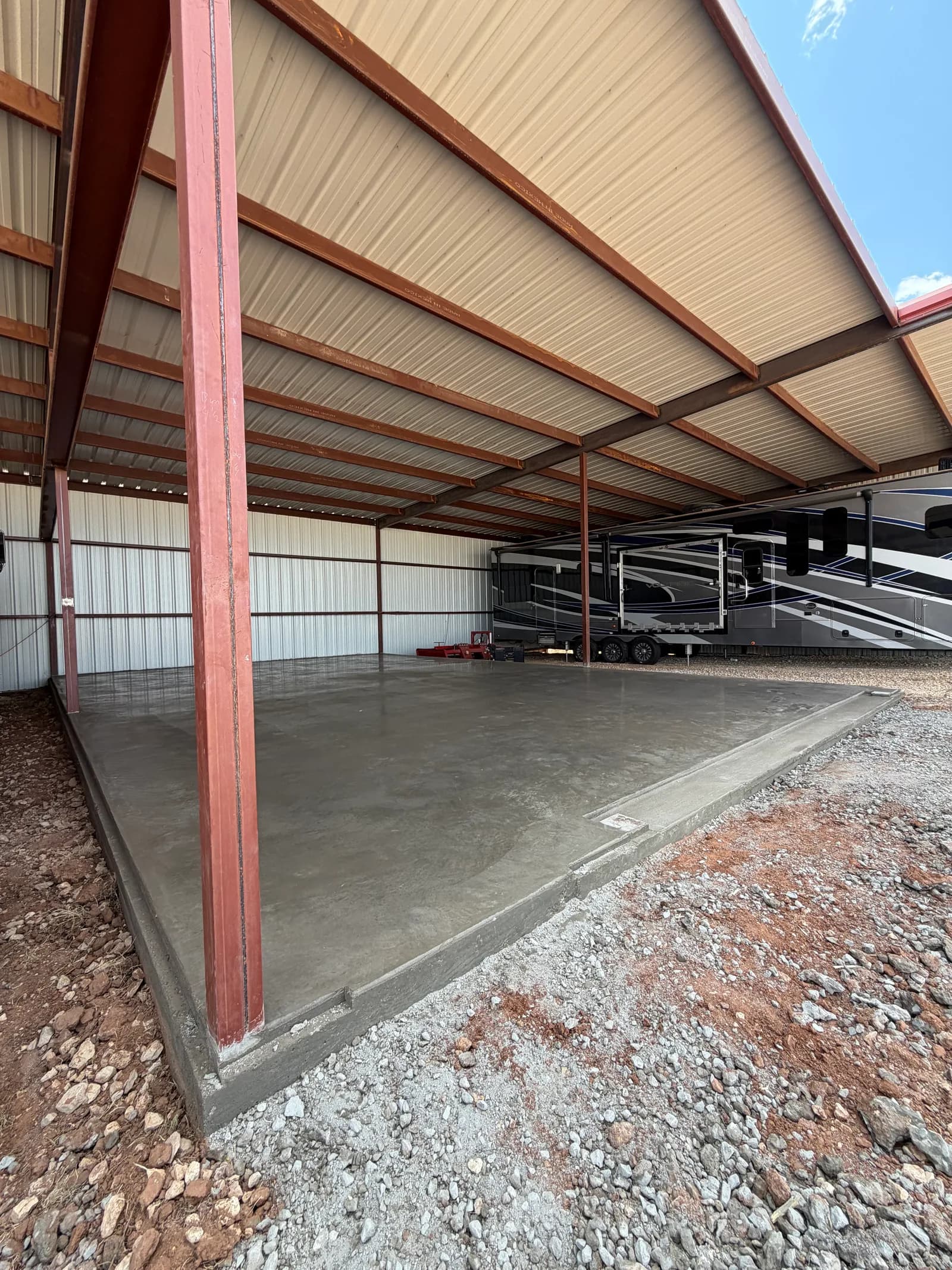 Childress 25' x 40' Carport Foundation — finished slab poured under the steel structure in Childress, TX
