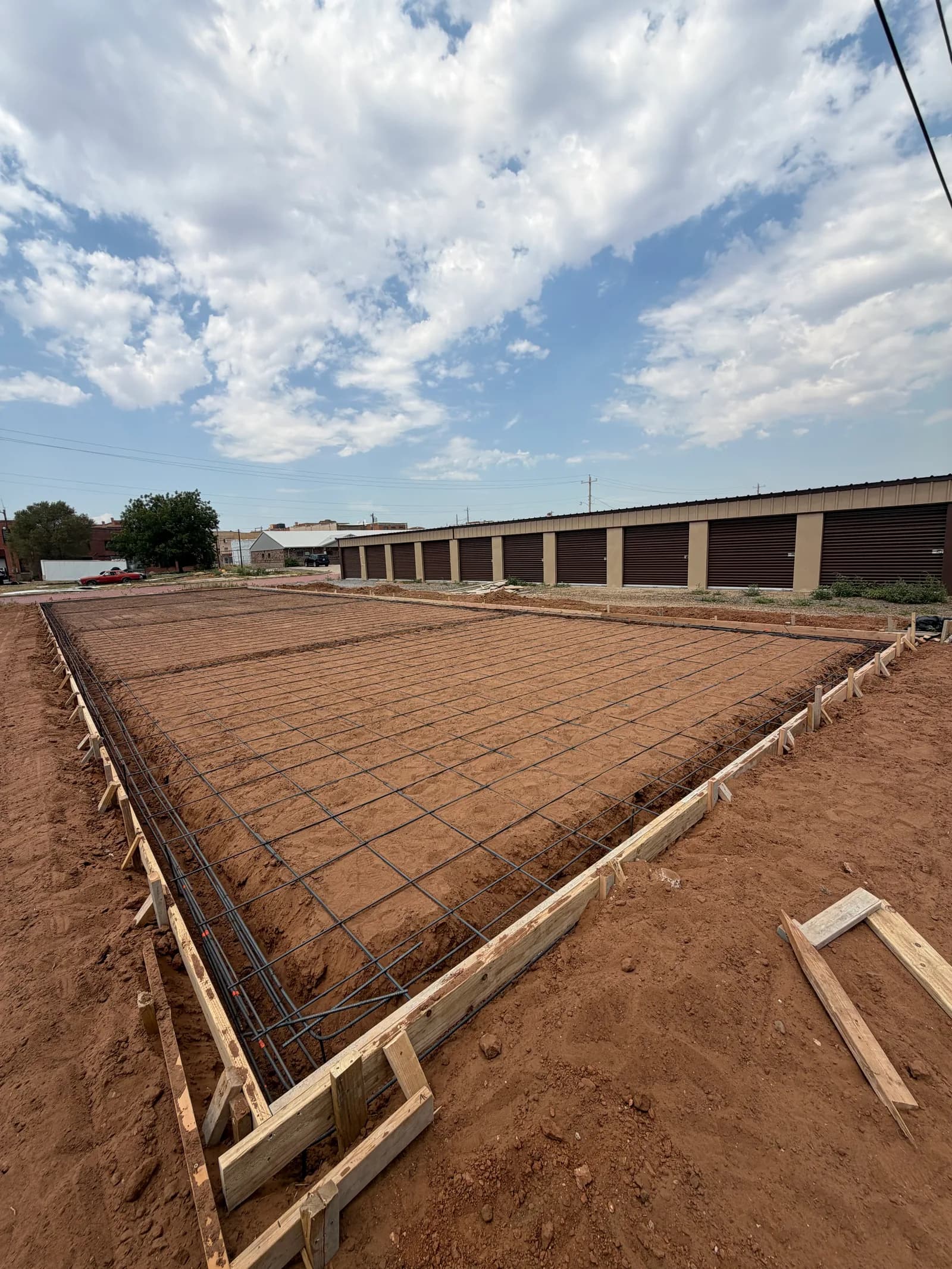 Childress 30' x 100' Storage Building Foundation — forming and reinforcement on the long footprint in Childress, TX