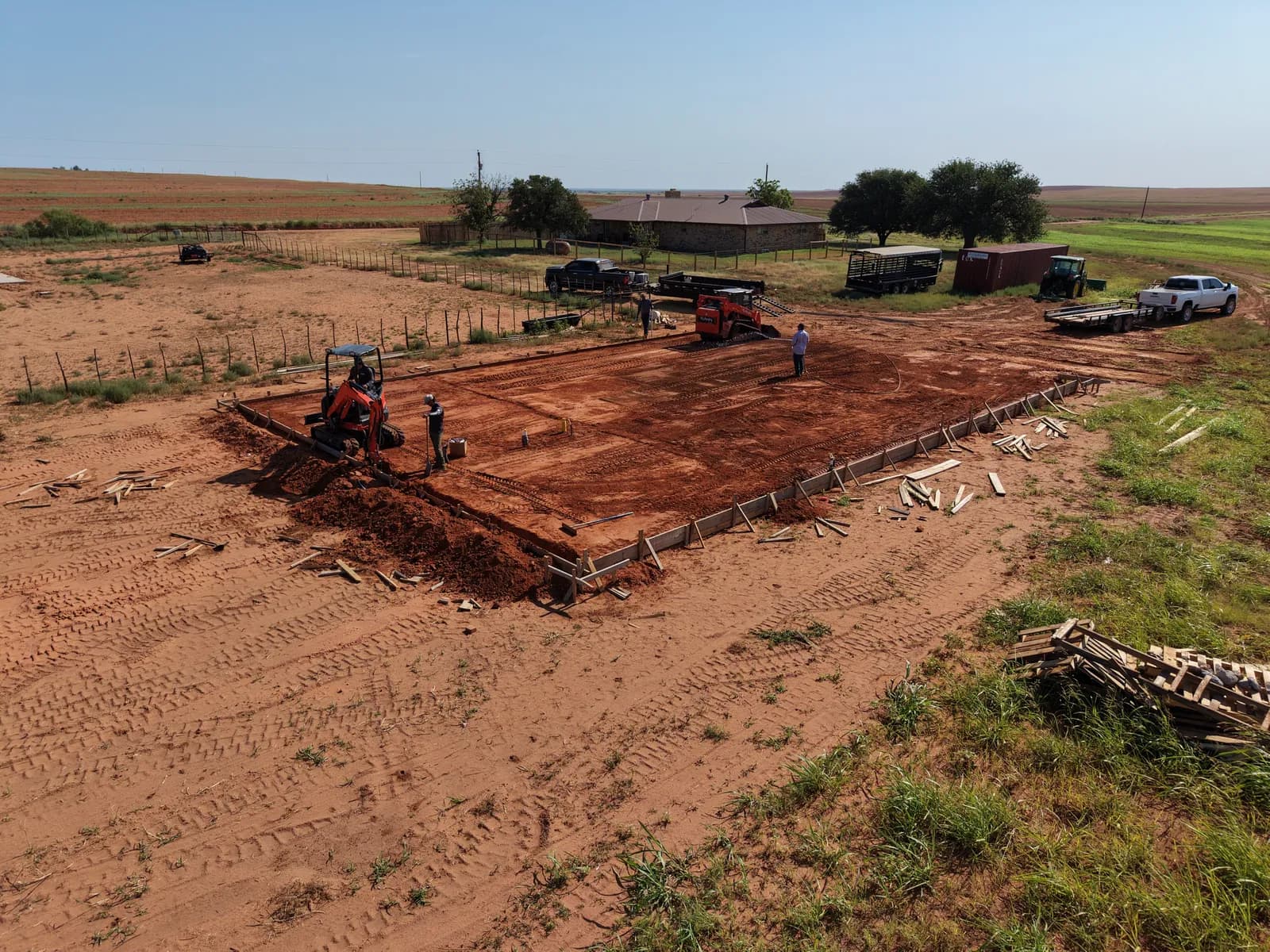 Paducah 50' x 70' Metal Building Foundation — aerial view of forming and grading in Paducah, TX