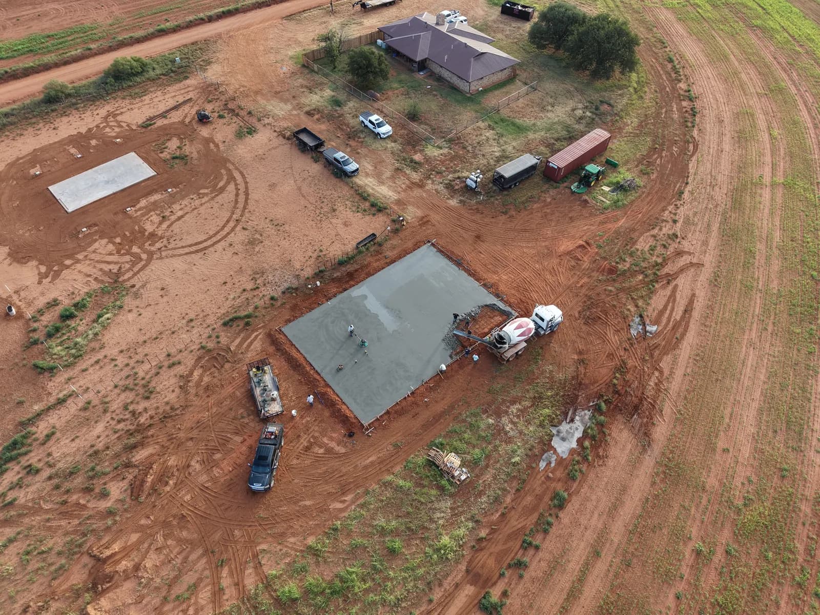 Paducah 50' x 70' Metal Building Foundation — reinforced slab pour in progress in Paducah, TX