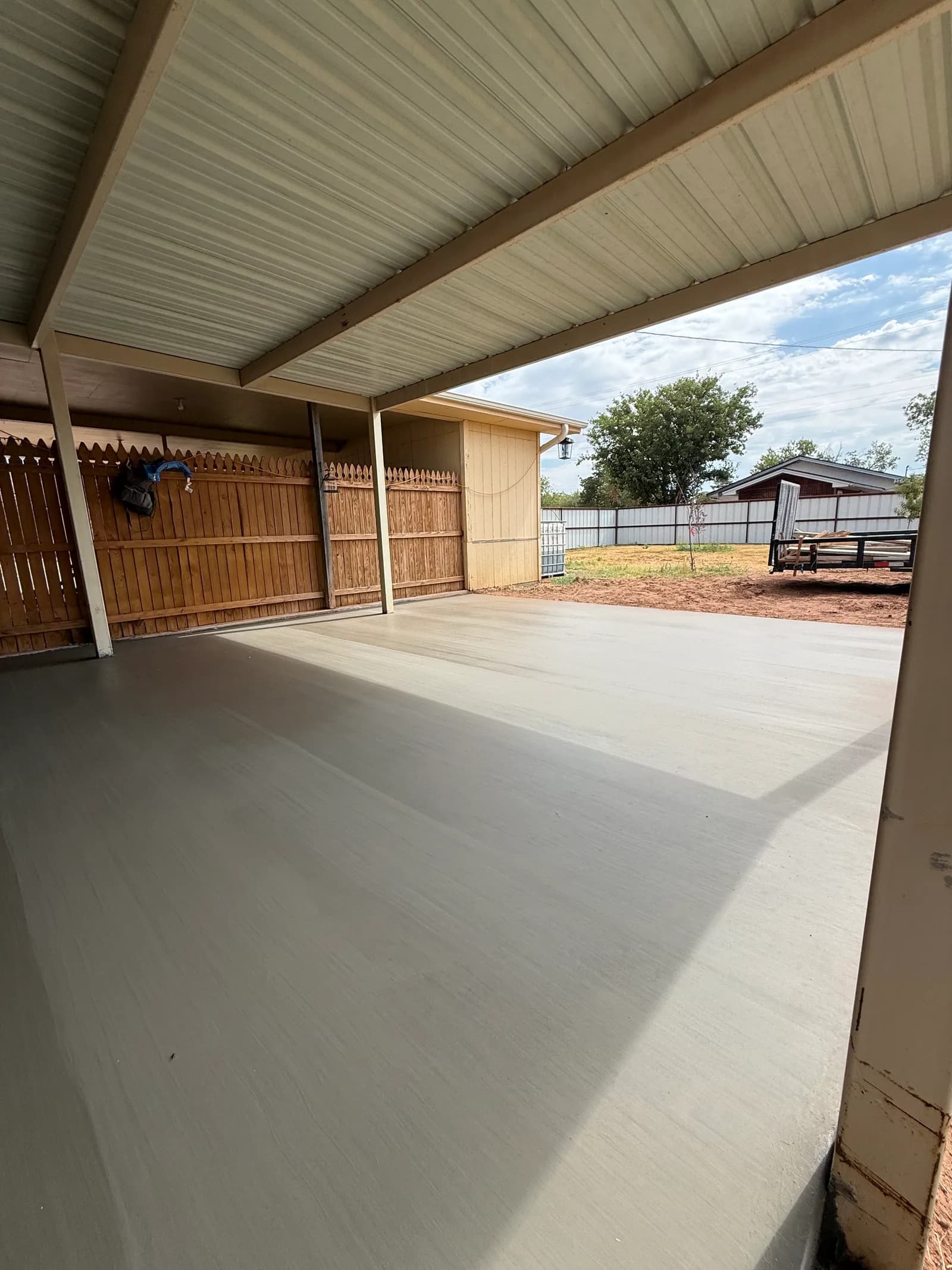 Crowell Backyard Concrete Patio — finishing the patio surface in Crowell, TX