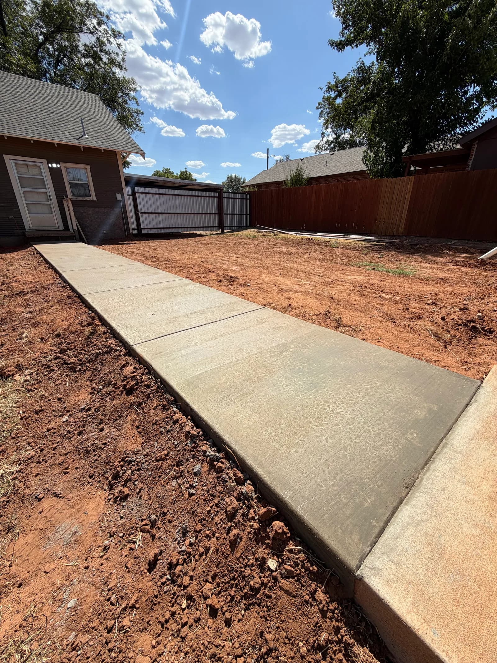Backyard Concrete Sidewalk - Project in Childress, Texas