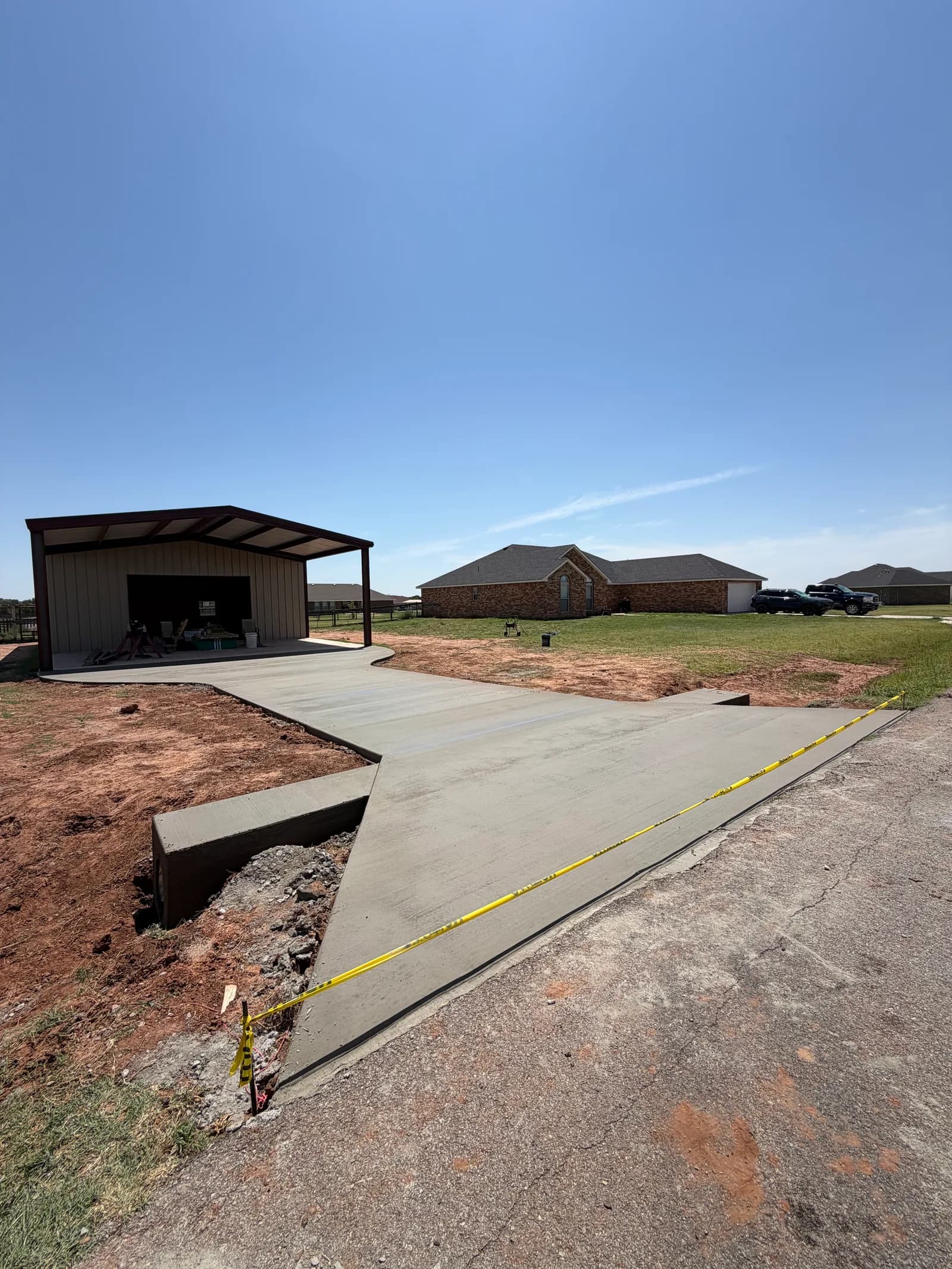Altus Concrete Driveway & Approach — finished driveway and street approach in Altus, OK