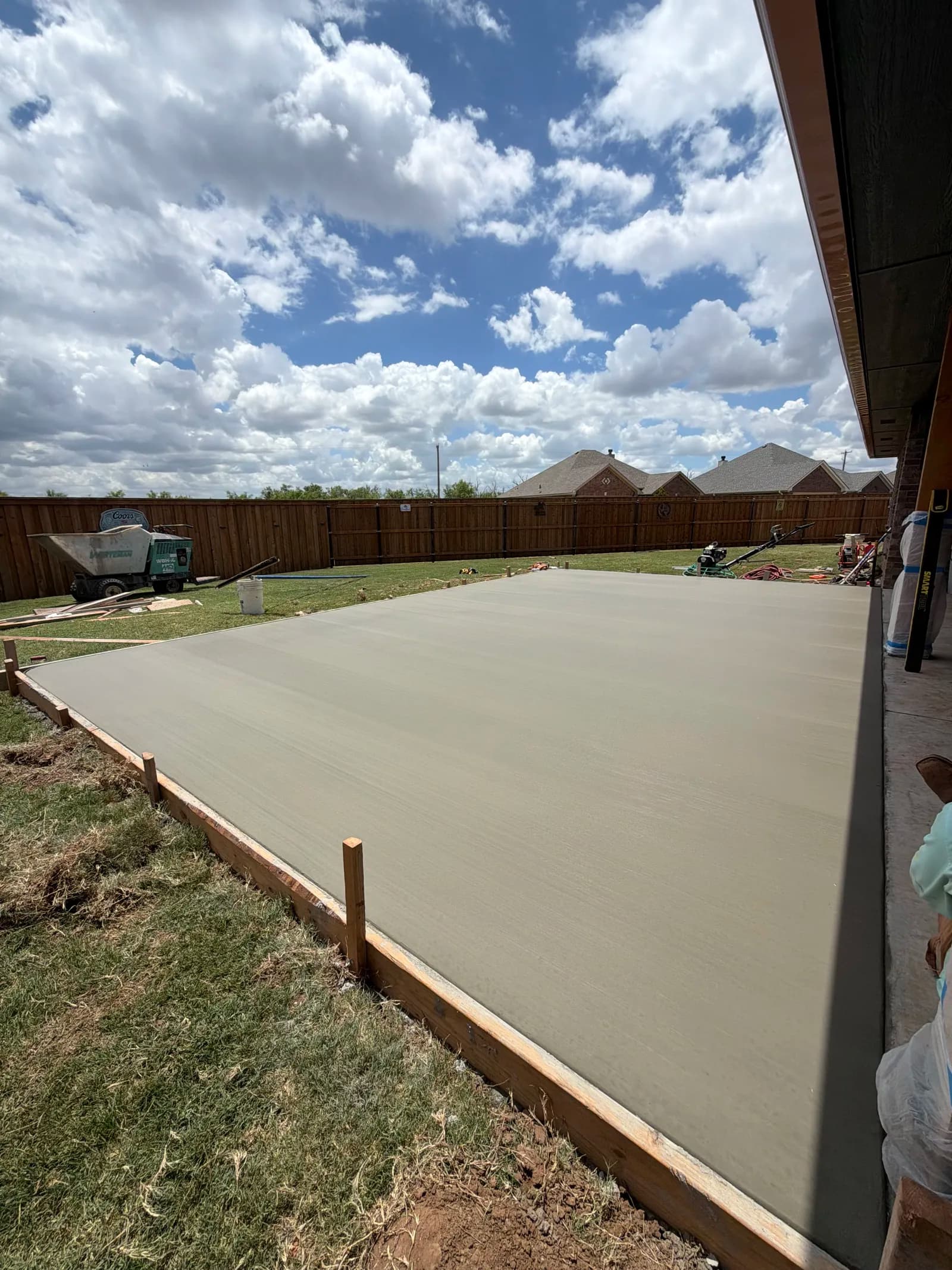 Wichita Falls Concrete Patio Extension — freshly poured patio slab in Wichita Falls, TX