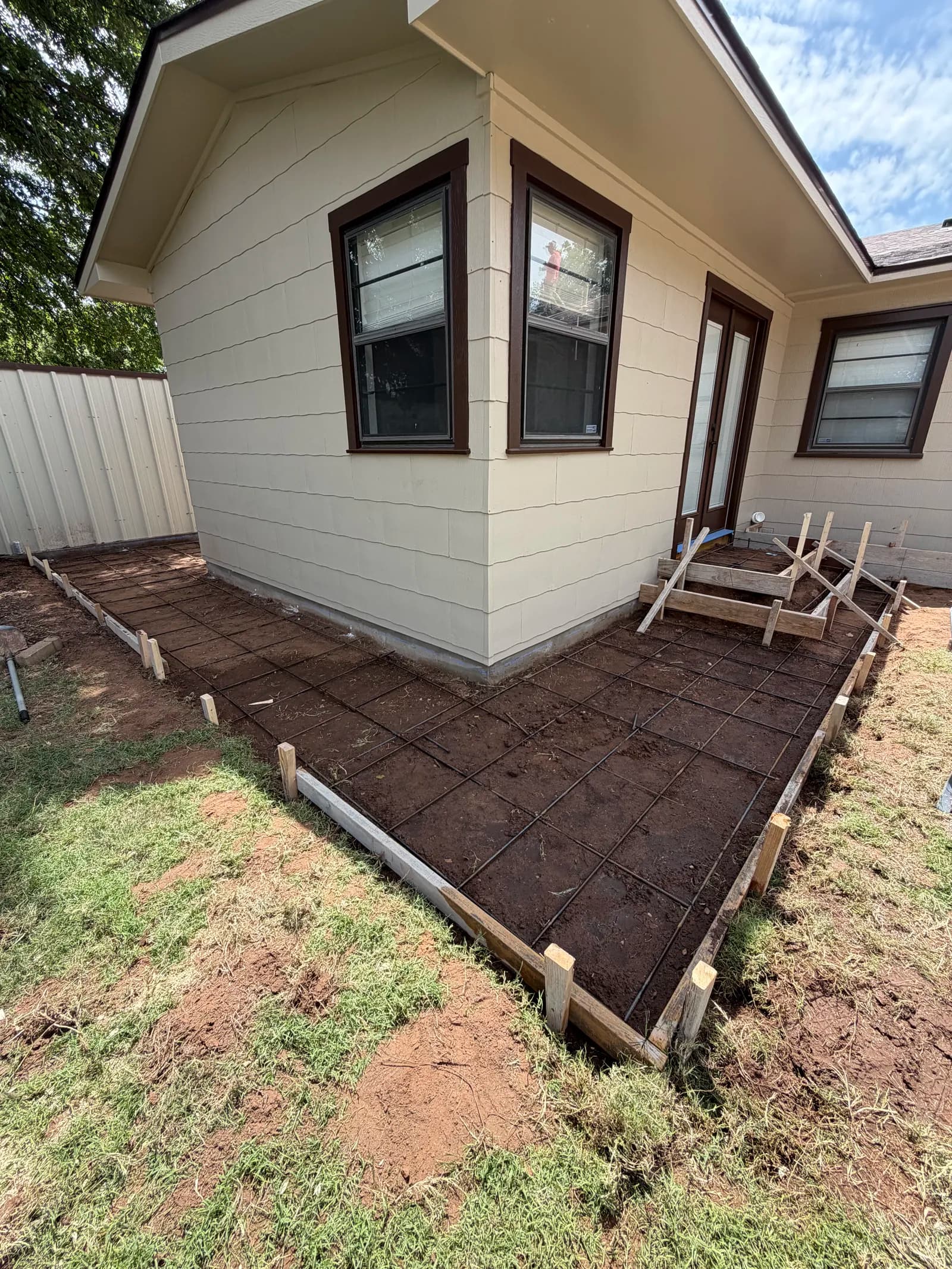 Vernon Concrete Steps & Sidewalk — forming and prep along the home in Vernon, TX